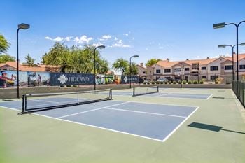 Sports court featuring pickleball and tennis court